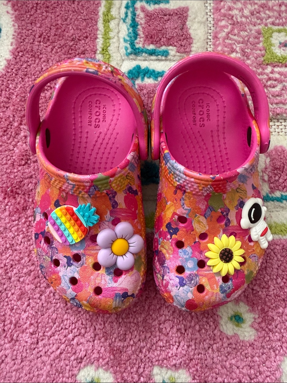 CROCS Kids Bright Pink Multi Floral Clogs with Charms